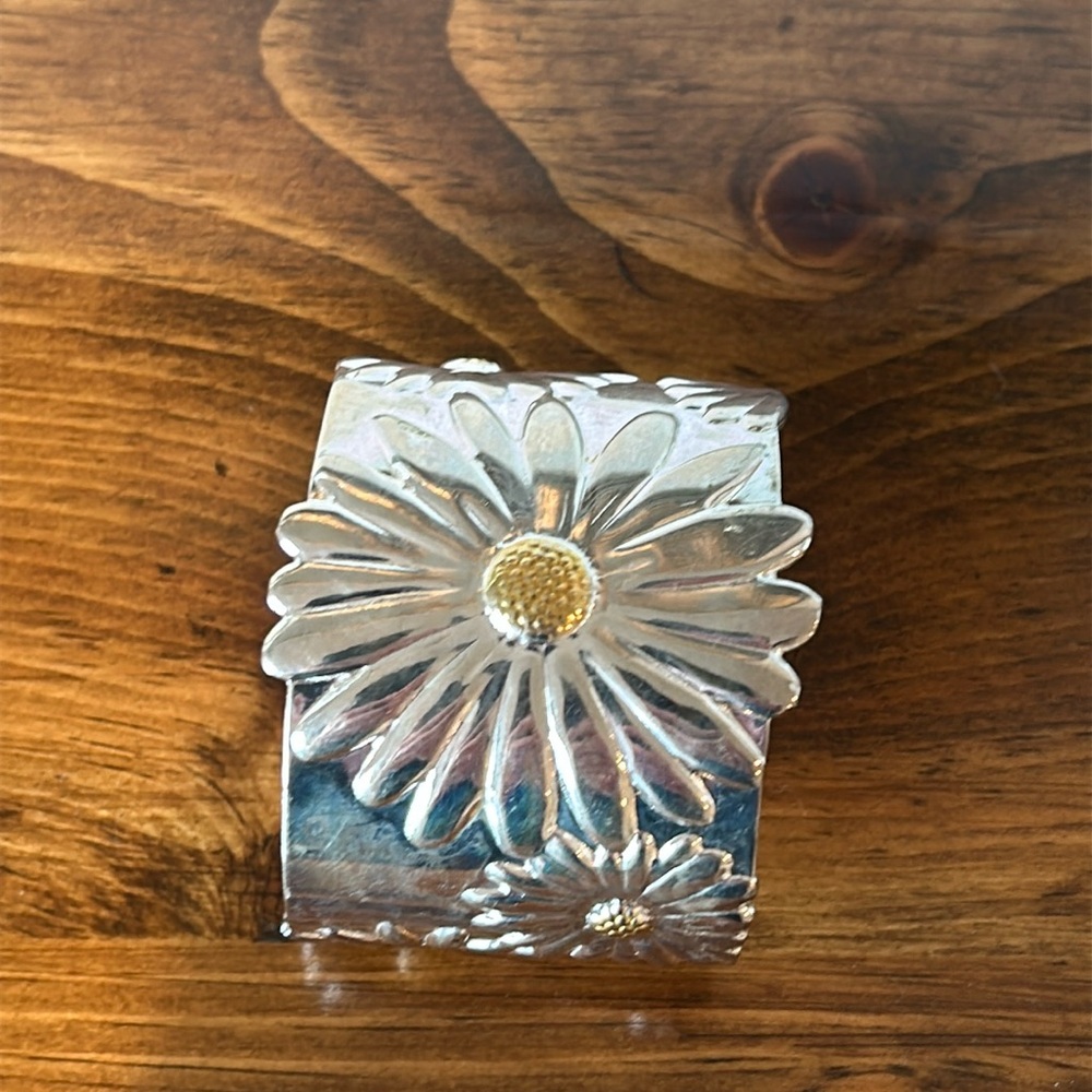 Silver tone flower cuff bracelet